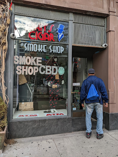 John's cigar exterior view showcasing professional Cannabis store services in New York, New York