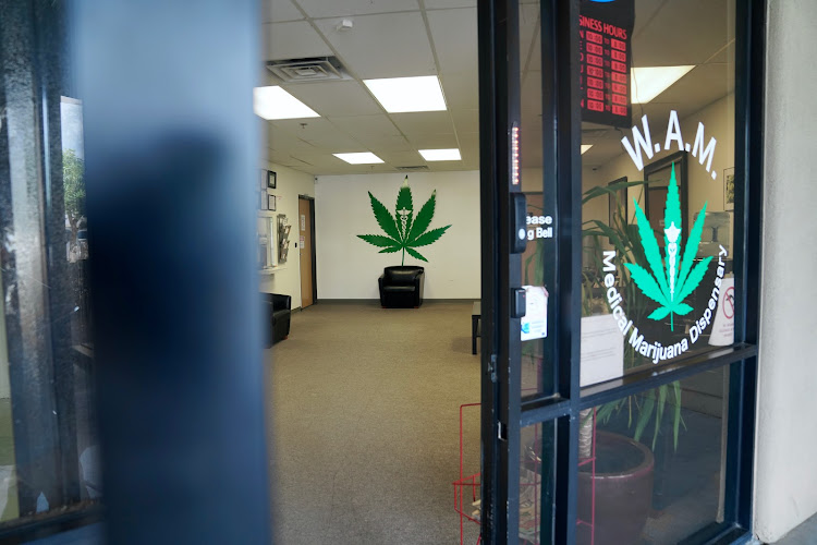 WAM Dispensary - Wickenburg Alternative Medicine exterior view showcasing professional Cannabis store services in El Mirage, Arizona